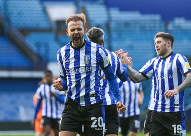 Sheffield Wednesday's Jordan Rhodes (left) celebrates scoring their side's fourth goal of the game against Cardiff at Hillsborough. Picture: Isaac Parkin/PA