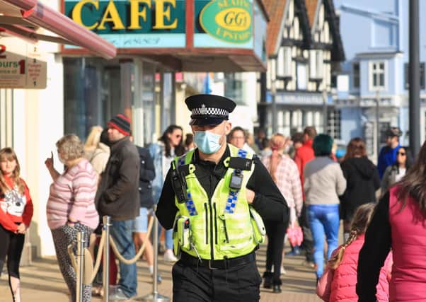 A police officer patrols the seafront in Scarborough as the region prepares for the next PCC elections.