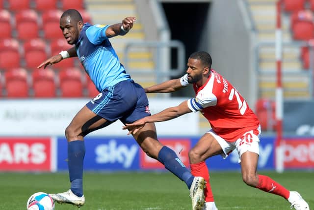TOUGH DAY: Rotherham United's Michale Ihiekwe tangles with Wycombe's Uche Ikpeazu. Picture: Dean Atkins.