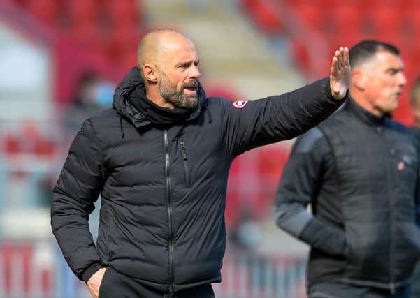 PICK UP: Rotherham United manager Paul Warne instructs from the sidelines during Monday's defeat to Wycombe. Picture: Dean Atkins.