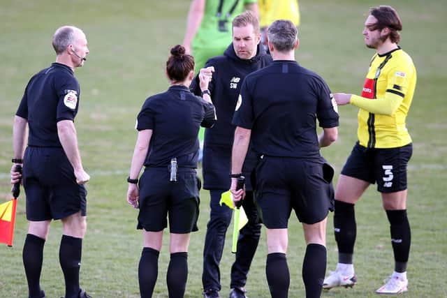 TOP JOB: Referee Rebecca Welch and Harrogate Town manager Simon Weaver meet after the final whistle. Picture: Nigel French/PA