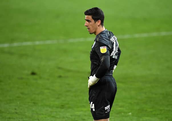 Night to forget: Huddersfield Town goalkeeper Joel Pereira was a late call-up for the ill Ryan Schofield and conceded seven on only his second start. Picture: Joe Giddens/PA Wire.