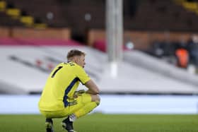 TOUGH TIMES: Sheffield United goalkeeper Aaron Ramsdale crouches dejected during the Premier League match at Craven Cottage. Picture: Andrew Couldridge/PA