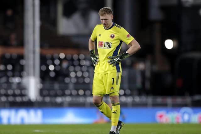 Sheffield United goalkeeper Aaron Ramsdale dejected after conceding their first goal during the Premier League match at Craven Cottage, London. Picture: Andrew Couldridge/PA