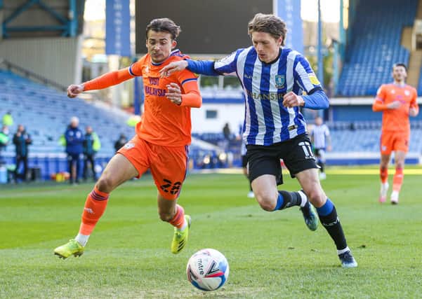 Sheffield Wednesday's Adam Reach (right) and Cardiff City's Tom Sang battle for the ball at Hillsborough on Monday. Picture: Isaac Parkin/PA