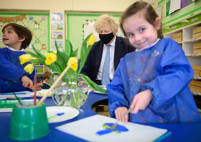 Boris Johson during a school visit - but when will he prioritise education policy?