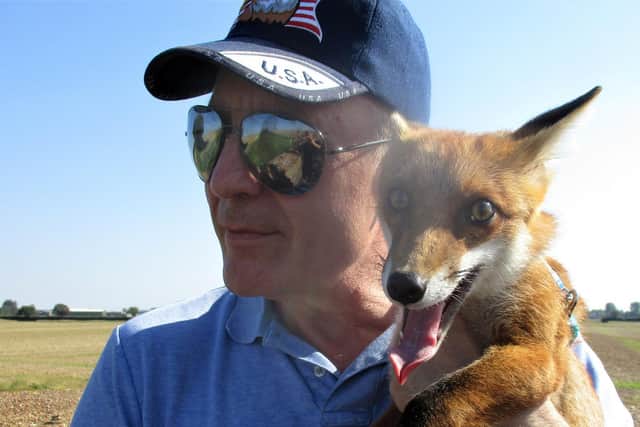 Les with Ben, who he rescued from a sanctuary (Pic: SWNS)