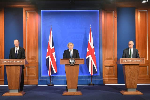 Chief Medical Officer Professor Chris Witty, Prime Minister Boris Johnson and Chief scientific adviser Sir Patrick Vallance, during a media briefing in London.