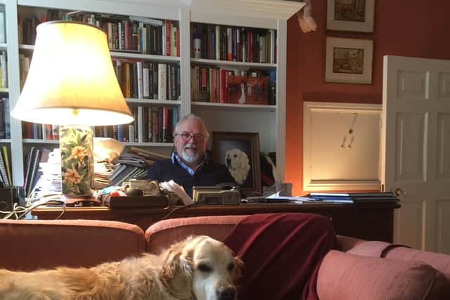 Martin Vander Weyer, current owner of Knipes Hall, with his dog, Douglas in the study