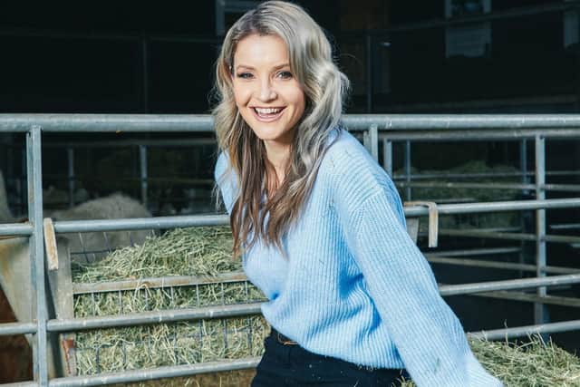 Helen Skelton helped to save the life of a newborn lamb.