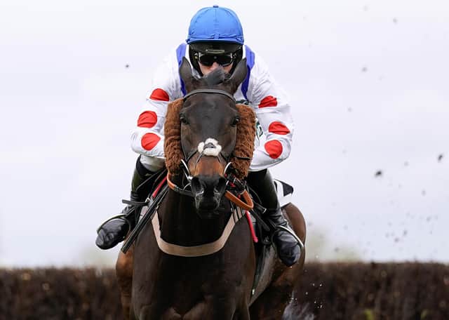 Clan Des Obeaux ridden by Harry Cobden clears the last on their way to winning the Betway Bowl Chase during Liverpool NHS Day of the 2021 Randox Health Grand National Festival at Aintree Racecourse, Liverpool.