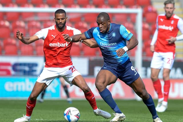 TOUGH GOING: Rotherham United's Michale Ihiekwe tangles with Wycombe's Uche Ikpeazu on Easter Monday. Picture: Dean Atkins.