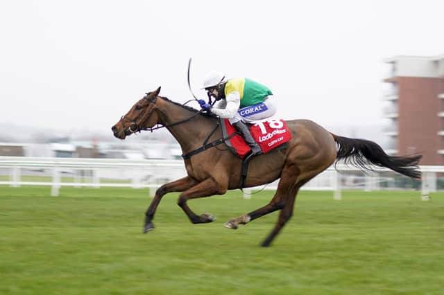 This was Randox Grand National favourite Cloth Cap streaking clear to win Newbury's Ladbrokes Trophy under Tom Scudamore.