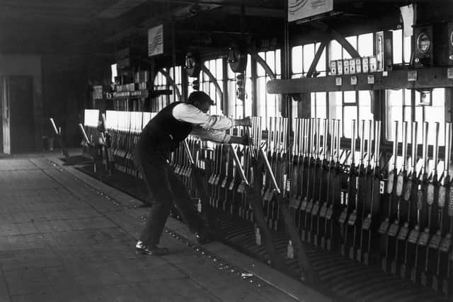September 1919:  A railway inspector at work as a signalman during the strike.  (Photo by Topical Press Agency/Getty Images)