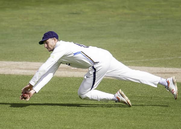 Good stop: Yorkshire's Joe Root fields the ball in a match which featers his brother Billy playing for Glamorgan. Picture by Allan McKenzie/SWpix.com