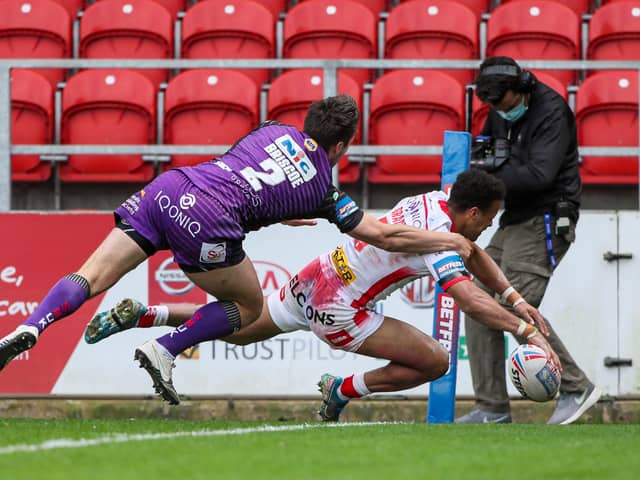 In the corner: St Helens' Regan Grace scores against Leeds Rhinos. Picture by Alex Whitehead/SWpix.com