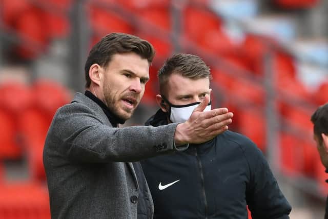 Doncaster's manager Andy Butler remonstrates with fourth offical. Picture Howard Roe/AHPIX LTD