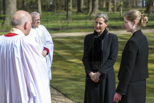 The Countess of Wessex, with her daughter Lady Louise Windsor, talks to Cannon Martin Poll, Domestic Chaplin to Her Majesty The Queen, as they attend the Sunday service at the Royal Chapel of All Saints, Windsor. Steve Parsons/PA Wire