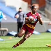 In the groove: Huddersfield Giants winger Jermaine McGillvary, left, scored a hat-trick against Leigh. Picture by Alex Whitehead/SWpix.com