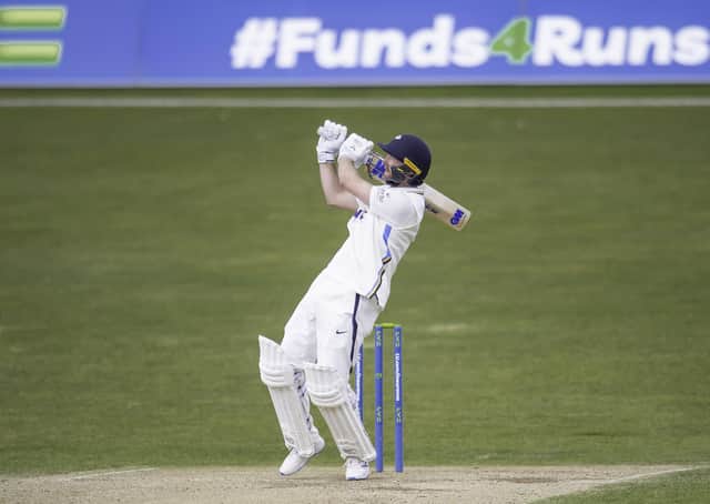 Maximum effort: Adam Lyth hits a six in his match-saving 115 not out against Glamorgan. Picture by Allan McKenzie/SWpix.com
