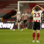 Sheffield United's Ben Osborn looks on dejected in defeat to Arsenal. Pictures: Andrew Yates/Sportimage