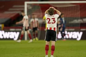 Sheffield United's Ben Osborn looks on dejected in defeat to Arsenal. Pictures: Andrew Yates/Sportimage