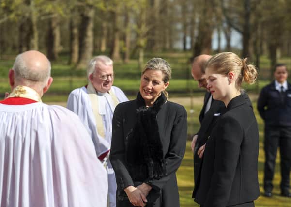 The Earl and Countess of Wessex, with their daughter Lady Louise Windsor, talk to Cannon Martin Poll, Domestic Chaplin to Her Majesty The Queen, as they attend the Sunday service at the Royal Chapel of All Saints at Royal Lodge, Windsor, following the announcement on Friday April 9, of the death of the Duke of Edinburgh at the age of 99.