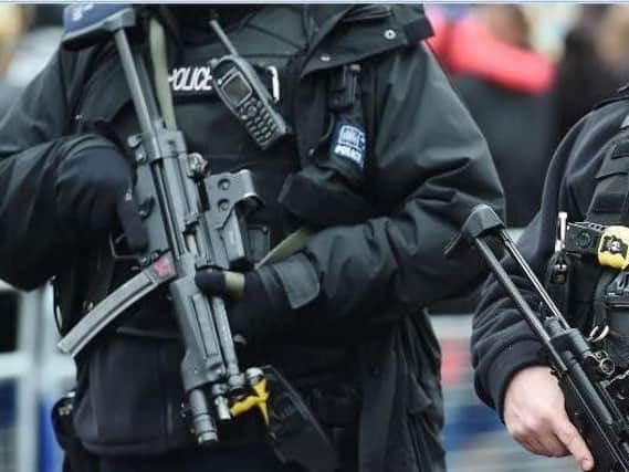 A generic picture of armed police.