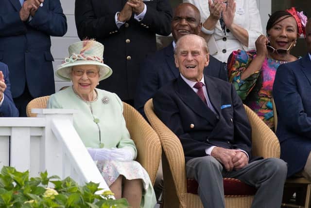 The Queen and Duke of Edinburgh at a polo event.
