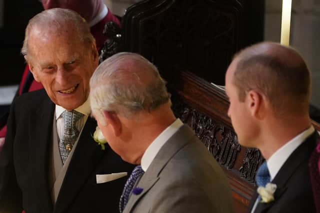 The Duke of Edinburgh with the Prince of Wales and Prince William.