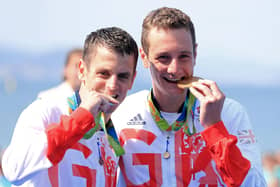 Great Britain's Alistair, right, and Jonny Brownlee with their gold and silver medals at the Rio Olympics. Picture: PA