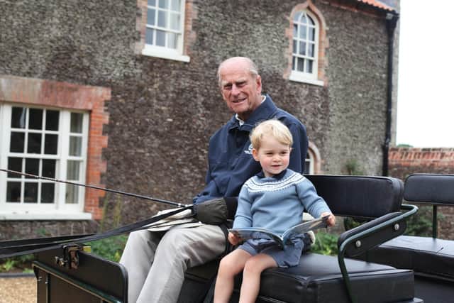 A touching photo of Prince Philip with his great-grandson Prince George. Photo: Duke and Duchess of Cambridge.