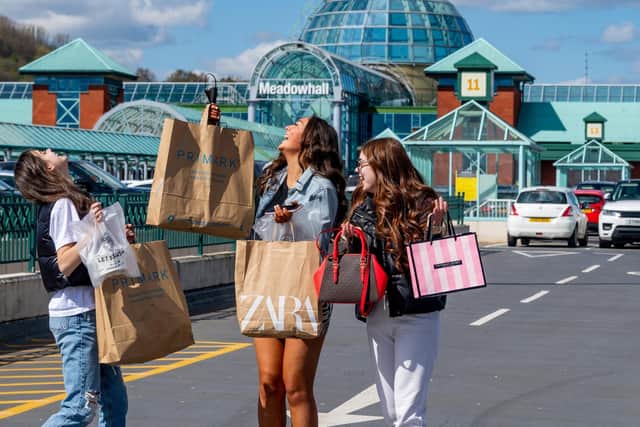 Members of the public returned yesterday to Meadowhall shopping centre, Sheffield. Pictured (left to right) Sisters Katie Snow,15, Abi Snow, 15, and Danielle Snow, 18, of Scunthorpe, celebrating shopping once again.
