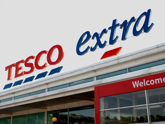 Tesco said pre-tax profits tumbled to £825m over the past year.
