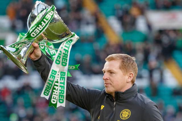 Celtic manager Neil Lennon shows off the Betfred Cup before the Ladbrokes Scottish Premiership match at Celtic Park, Glasgow (Picture: Steve Welsh/PA Wire)