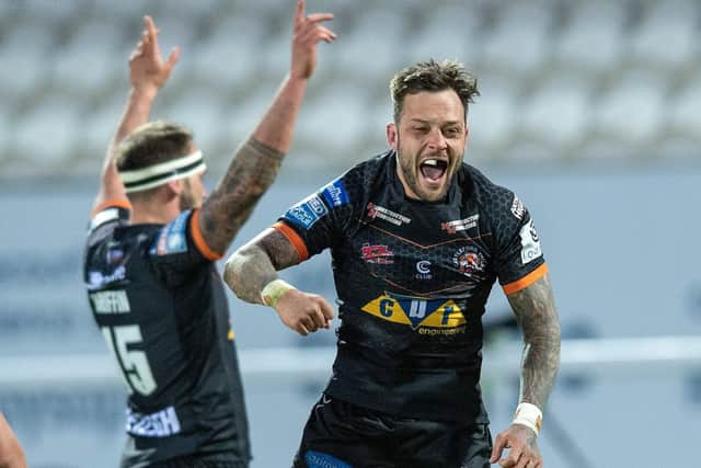 Winning feeling: Gareth O'Brien celebrates scoring the Golden Point to take Castleford Tigers through to the next round of the Challenge Cup against Hull KR. Picture Bruce Rollinson