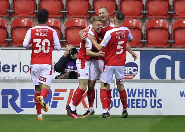 Rotherham United’s Michael Smith is congratulated by team-mates after scoring the third Millers goal against QPR. Picture: Alex Livesey/Getty Images