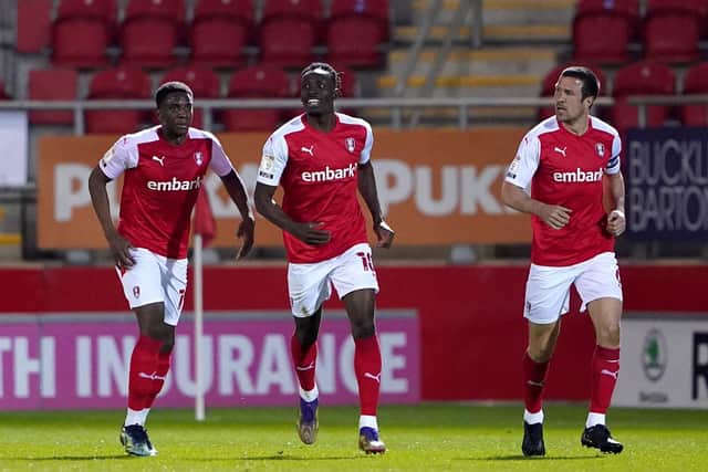 Rotherham United's Freddie Ladapo (centre) celebrates scoring their side's first goal. Picture: PA