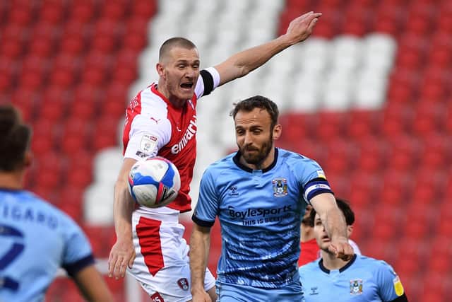 Rotherham's Michael Smith takes on Coventry's Liam Kelly. Picture: Jonathan Gawthorpe