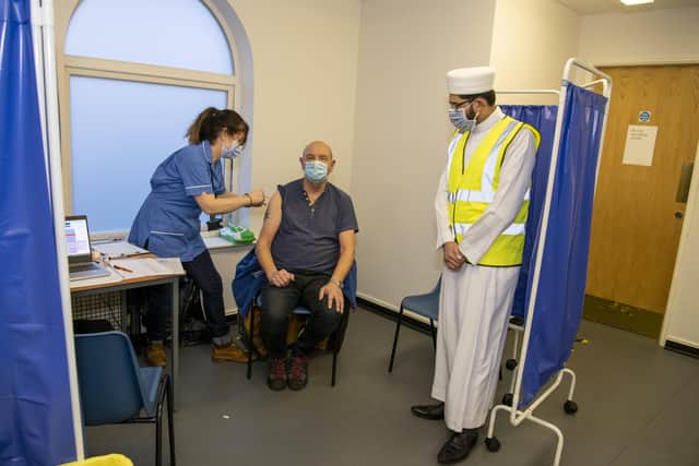 Leeds imam Qari Asim during a visit to a vaccine centre to encourage take-up amongst ethnic minority communities.
