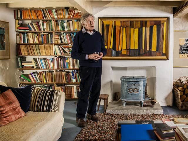 Art collector Ronnie Duncan in his home near Otley with Yellow Verticals by Terry Frost painted whilst in Leeds in the 1960s hanging on the wall in his front room. Picture: Tony Johnson