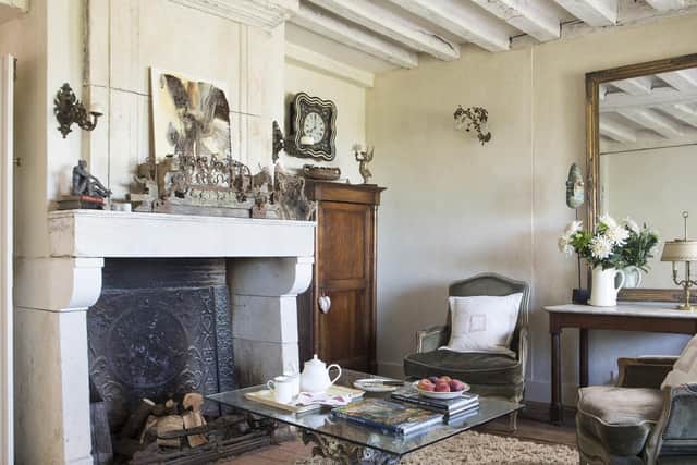 The reclaimed 17th century fireplace was bought from a French dealer. (Picture: Features Services).