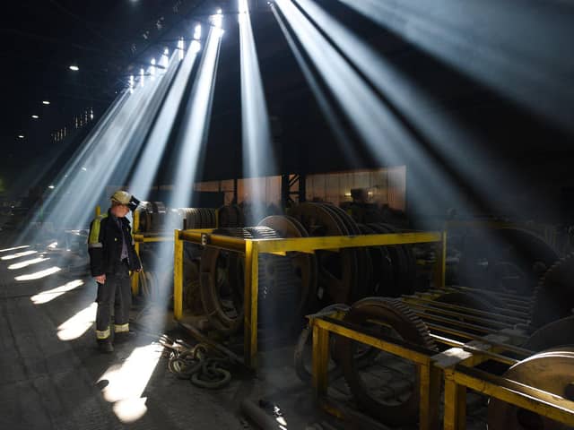 An employee inspects engineering spares in the Melt Shop at Sheffield Forgemasters International Ltd. in Sheffield, northern England on August 27, 2015. Getty Images