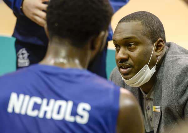 Atiba Lyons talks to Kipper Nichols and his Sheffield Sharks team at a timeout. (Picture: Dean Atkins)