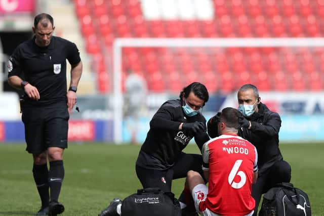 Wounded warrior: Rotherham United's Richard Wood receives medical attention during the 1-0 defeat. Picture: Zac Goodwin/PA Wire.