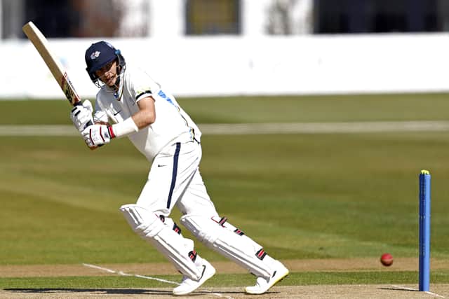 Words of encouragement: England captain Joe Root has been impressed with Adam Lyth's form this season. Picture: Max Flego