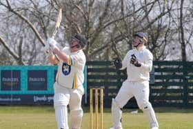 Contribution: Pudsey St Lawrence captain Chris Marsden, left,  scored 32 runs and took five wickets.. (Picture: Steve Riding)