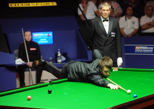 That missed blue - England's Judd Trump at the table during the final at the Betfred.com World Snooker Championships of 2011 against John Higgins (Picture: Anna Gowthorpe/PA)
