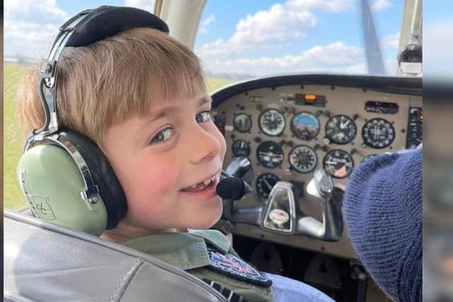Pictured, seven-year-old Jacob Newson, from Leeds, took the controls of the Piper PA-28 Cherokee during a flight out of White Waltham Airfield, near Maidenhead, on Friday. Submitted photo: Andrew Newson