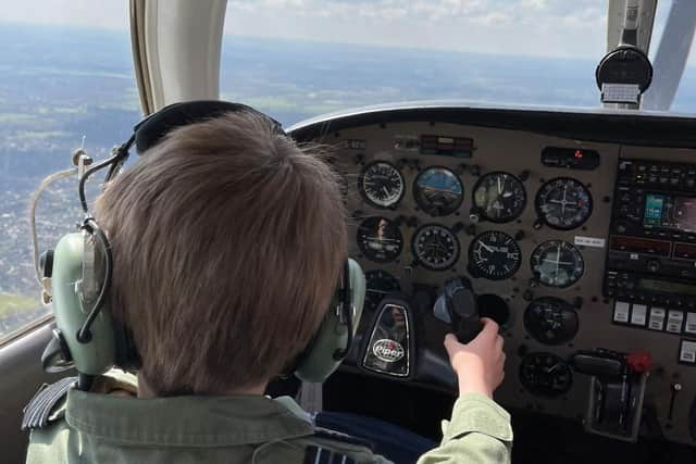 Under the guidance of instructor Mark Green, Jacob (pictured) was able to take control of the plane for roughly 10 seconds when they were 3,000ft (914m) in the air. Submitted photo Andrew Newson